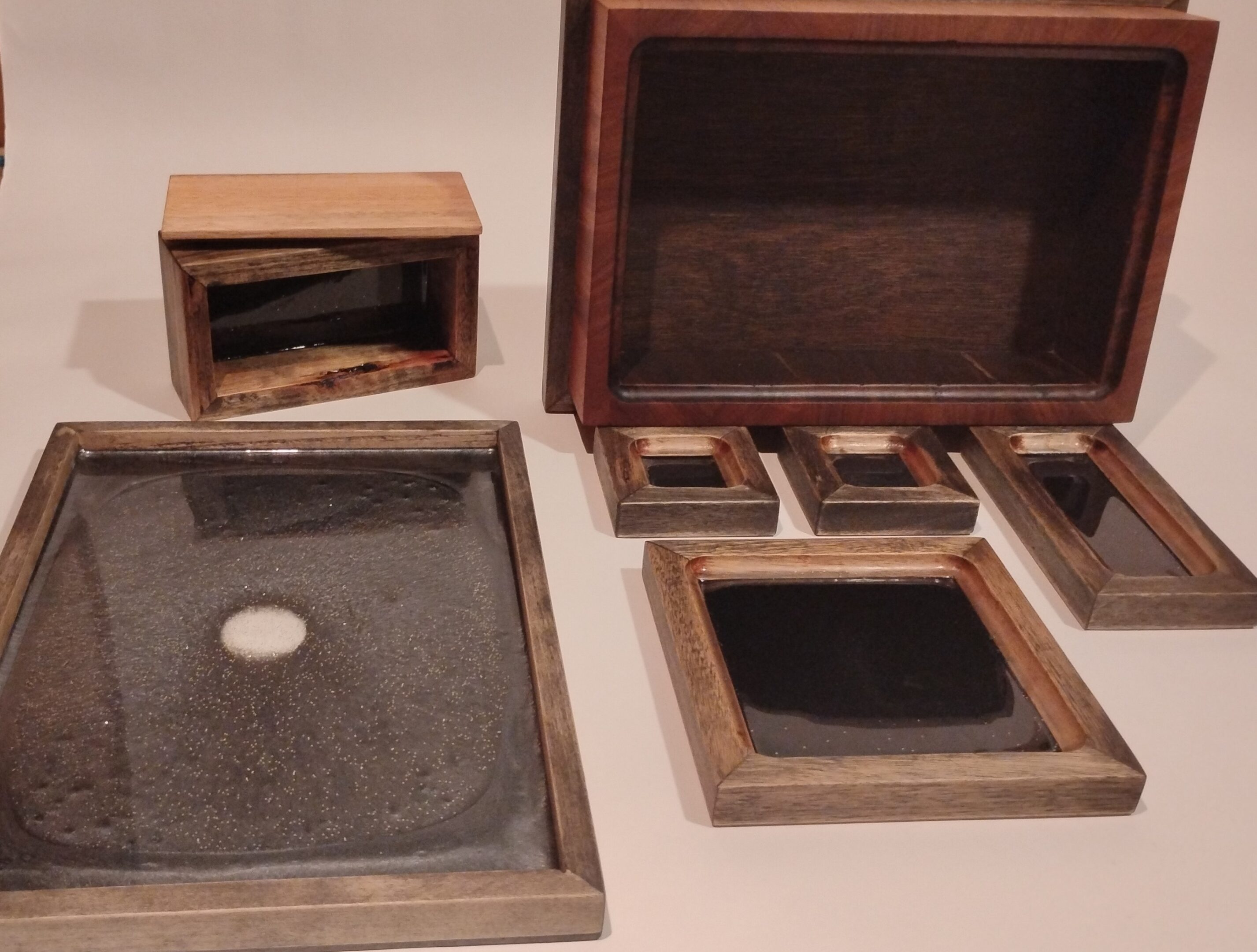 An assortment of vintage camera parts and lens components.