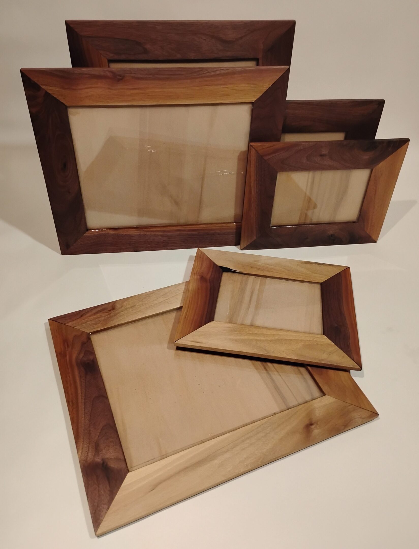 Set of wooden picture frames with a rustic finish.