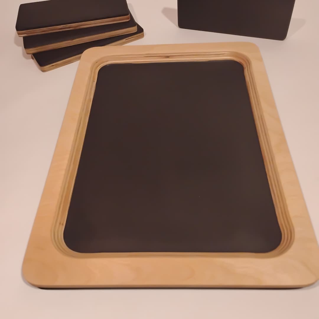 Wooden tray with a black rectangular insert.